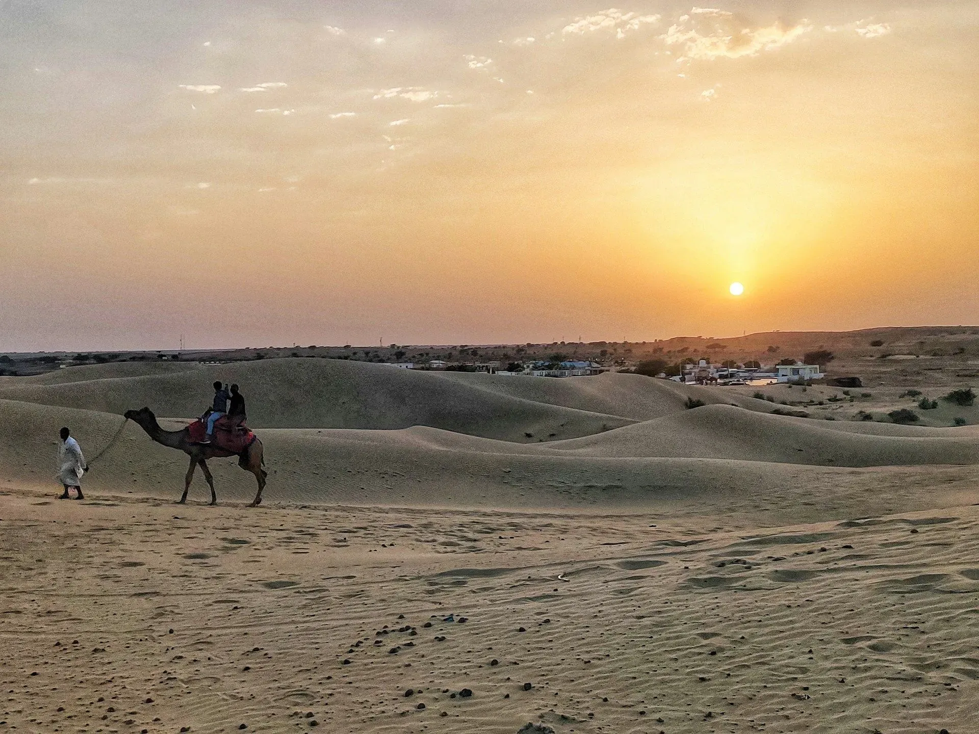 Sunset view of Jaisalmer city and surrounding desert landscape in Rajasthan.